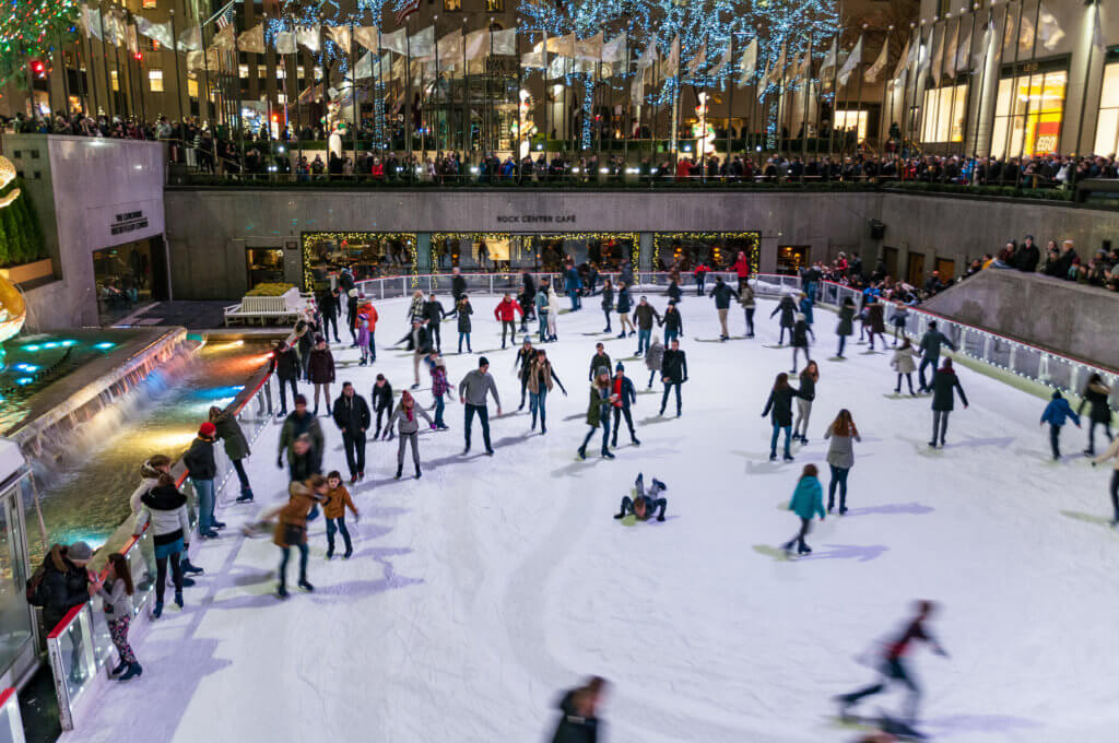 People skating outside at Rockefeller Center in New York City.